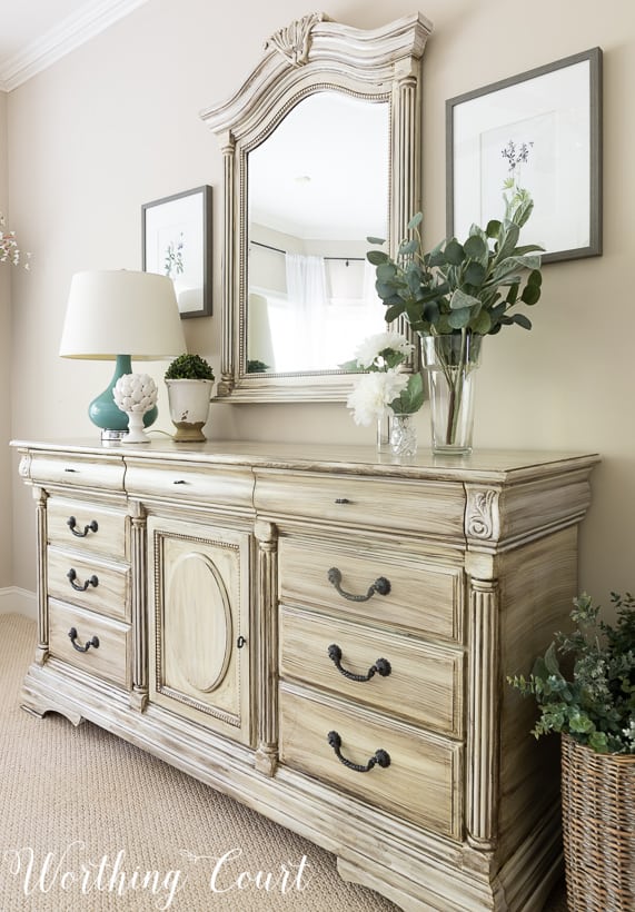 Traditional white dresser painted white with gray wash paint