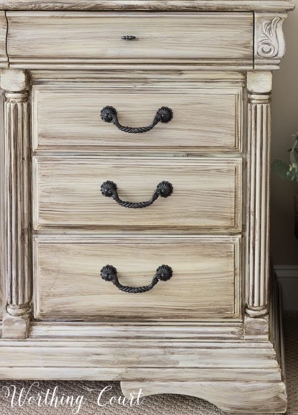 traditional bedroom dresser painted white with a gray wash finish