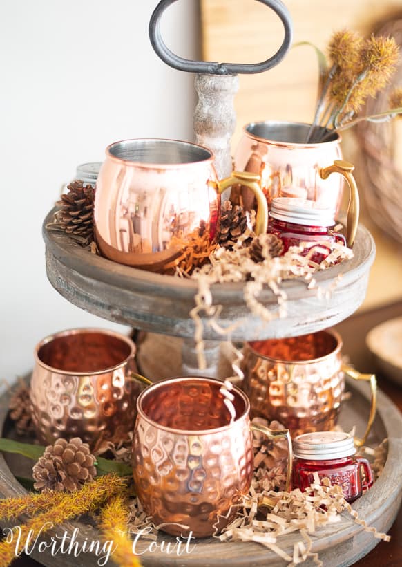 fall decor with a two tiered tray with copper Moscow mule mugs