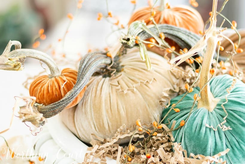 fall centerpiece with velvet pumpkins