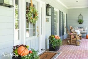 front porch with fall decorations
