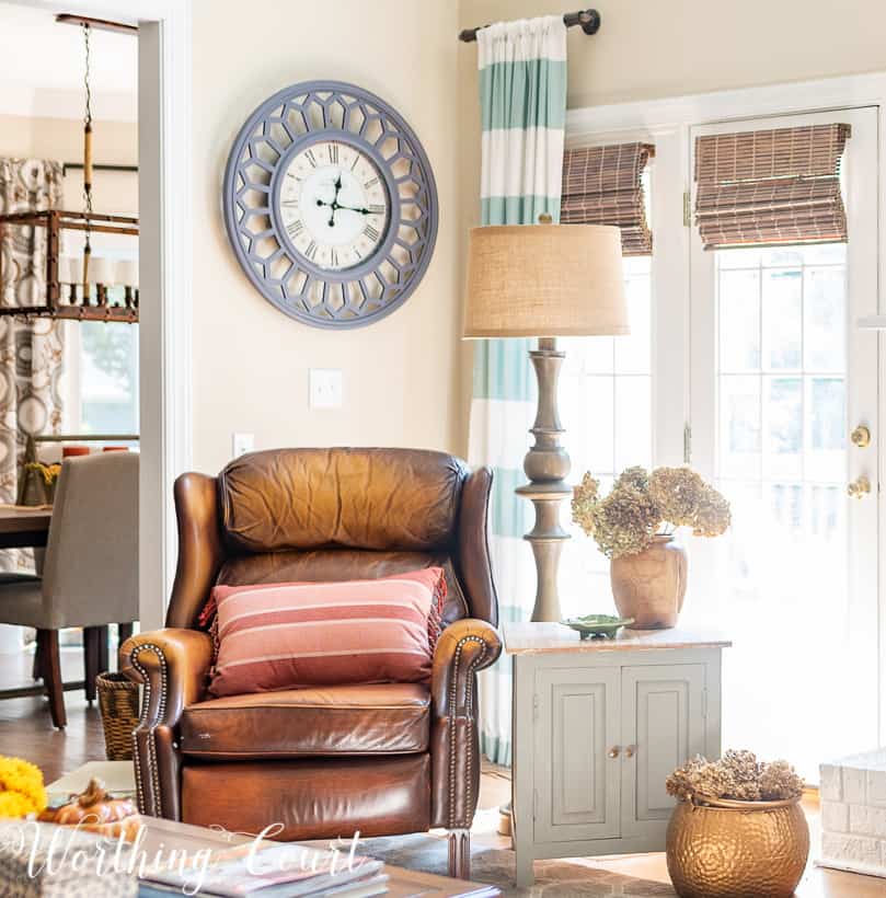 leather recliner surrounded with fall decorations