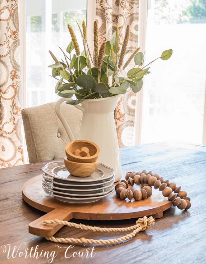 round bread board with fall decorations