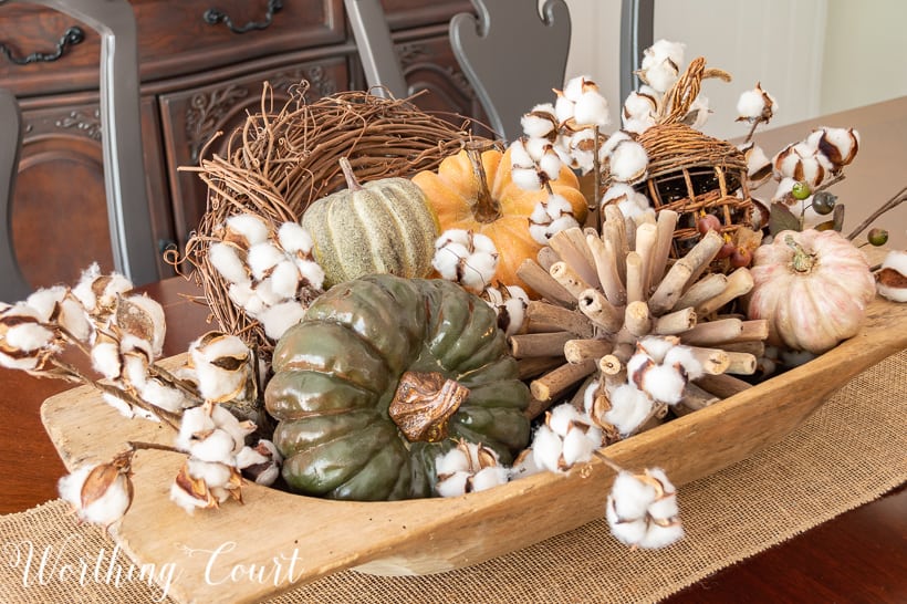 dough bowl centerpiece fill with fall pumpkins