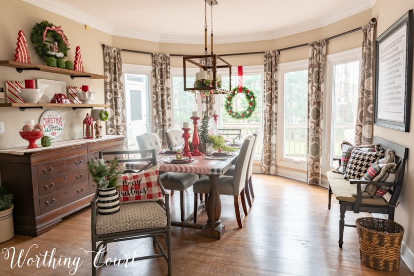 Festive Christmas tablescape with red, green and white in the dining room.