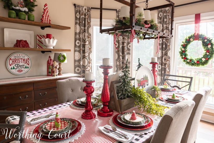 A red, white, and green tablescape in the dining room.