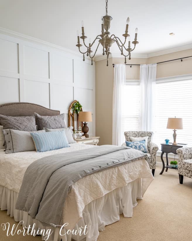 gray and white bedroom decor showing negative space design