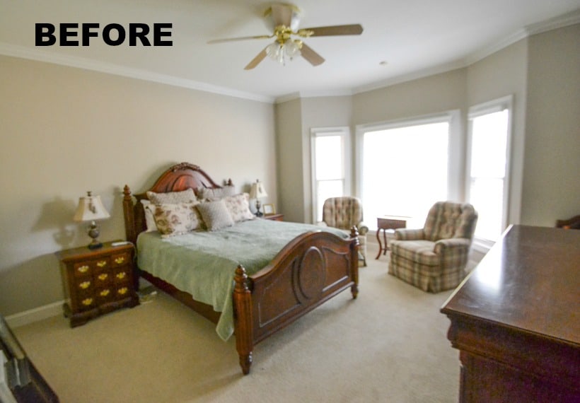 The bedroom before with a ceiling fan.