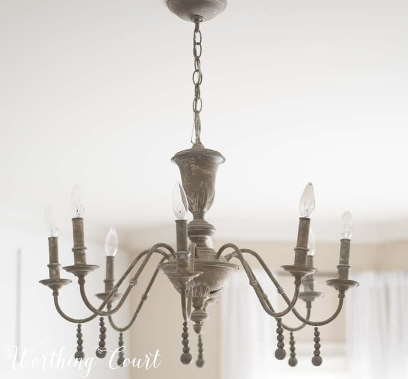 chandelier painted with beige, gray and white paint