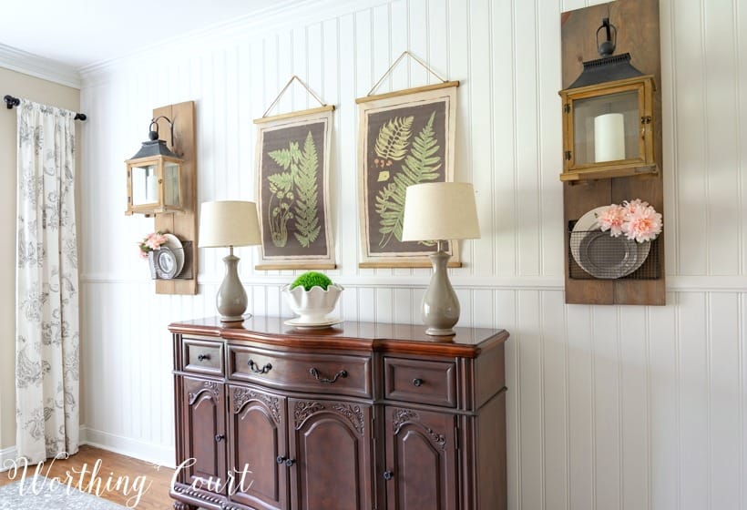 Dining room wall art above a sideboard.