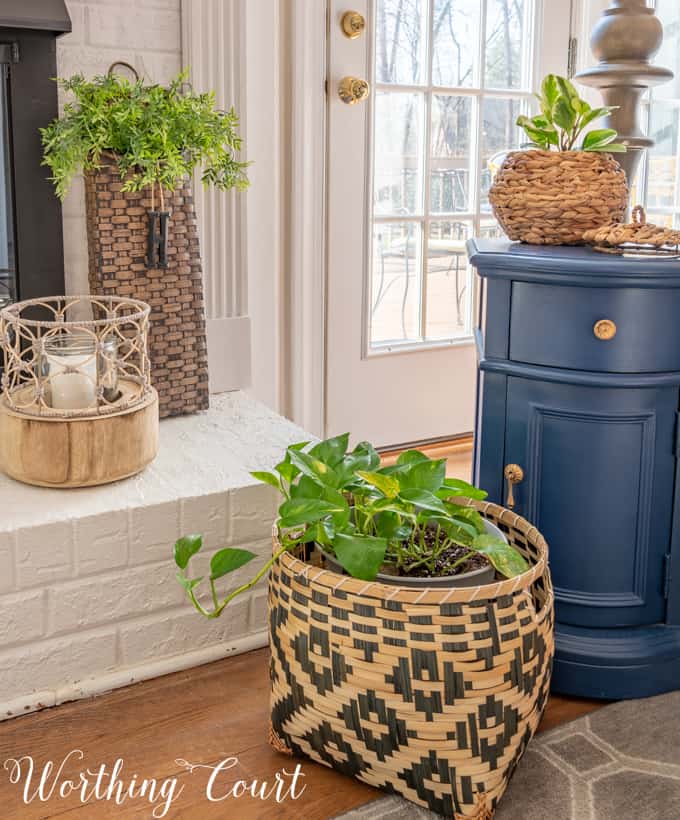 Spring fireplace hearth plants and baskets.