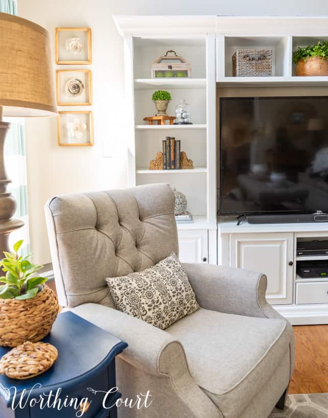 A neutral armchair in the living room.