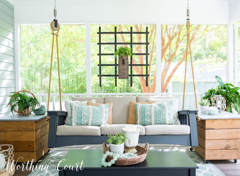 porch swing on a screened in porch