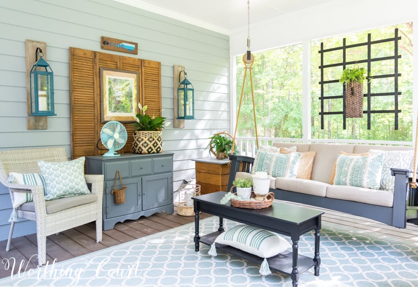 screened in porch decor with swing