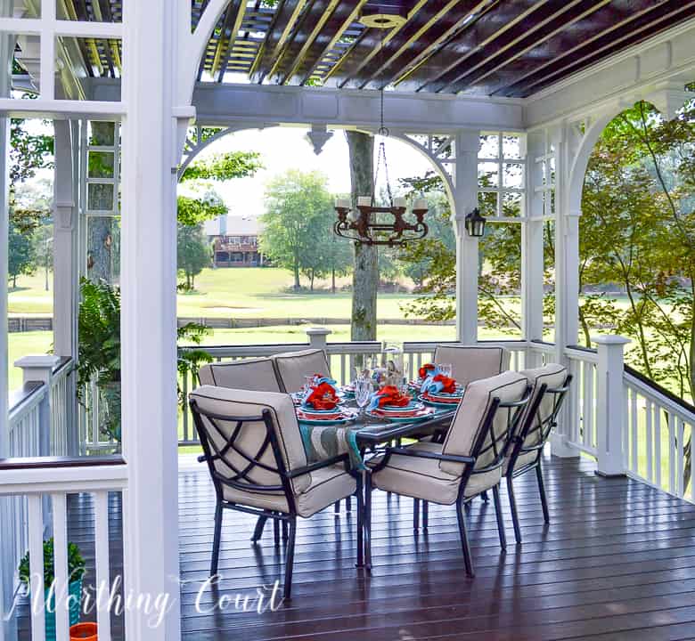 dining table and chairs on a deck