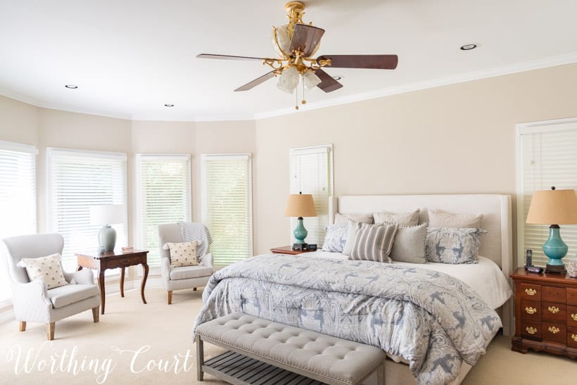 bedroom with neutral walls and neutral bedding