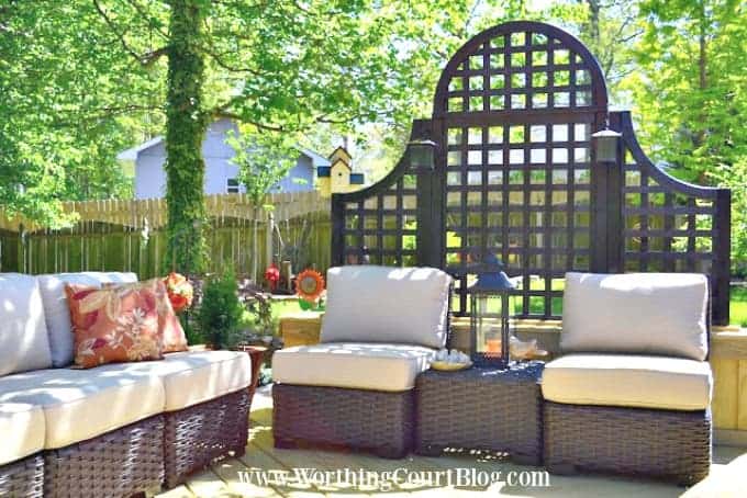 outdoor furniture in front of lattice wall