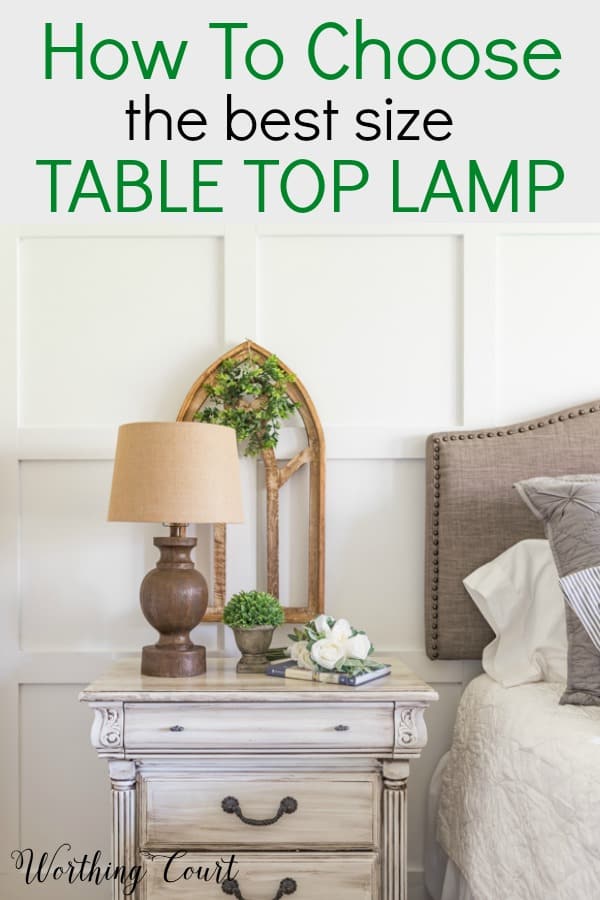 white nightstand with wood table top lamp