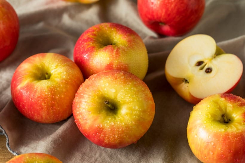 Unbaked apples on the counter.