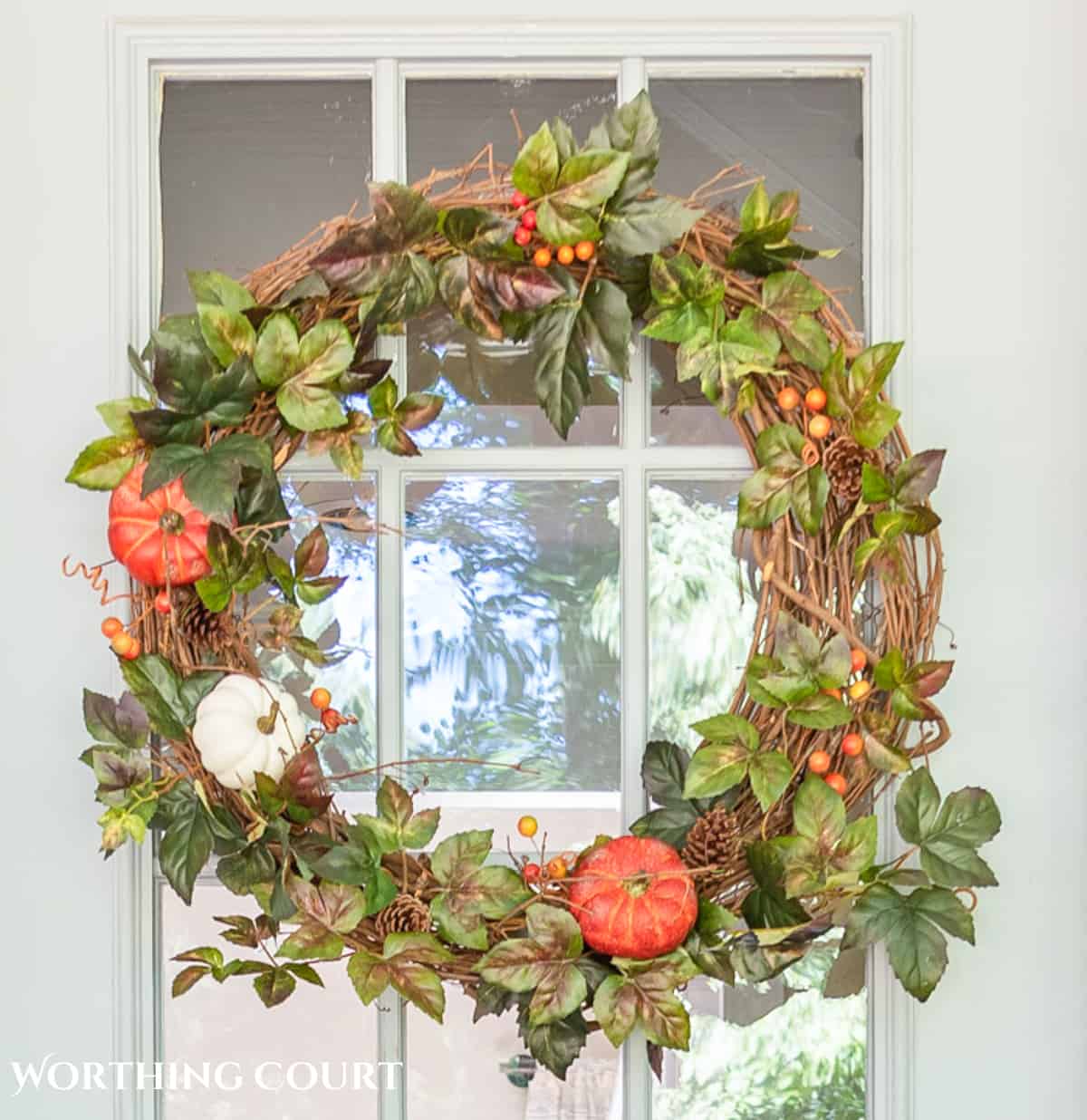 diy fall grapevine wreah on a gray front door