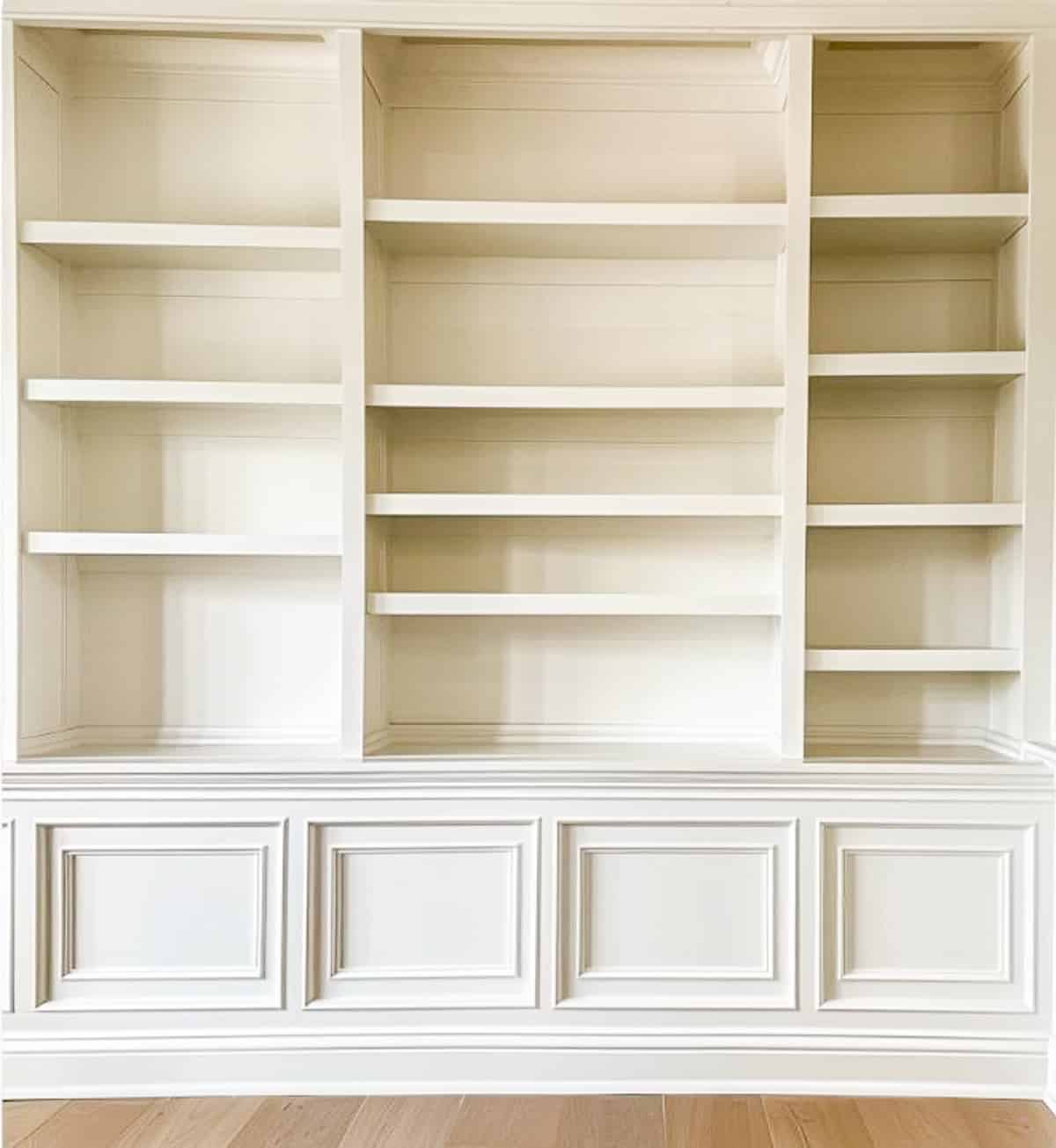 white built-in shelves that are empty