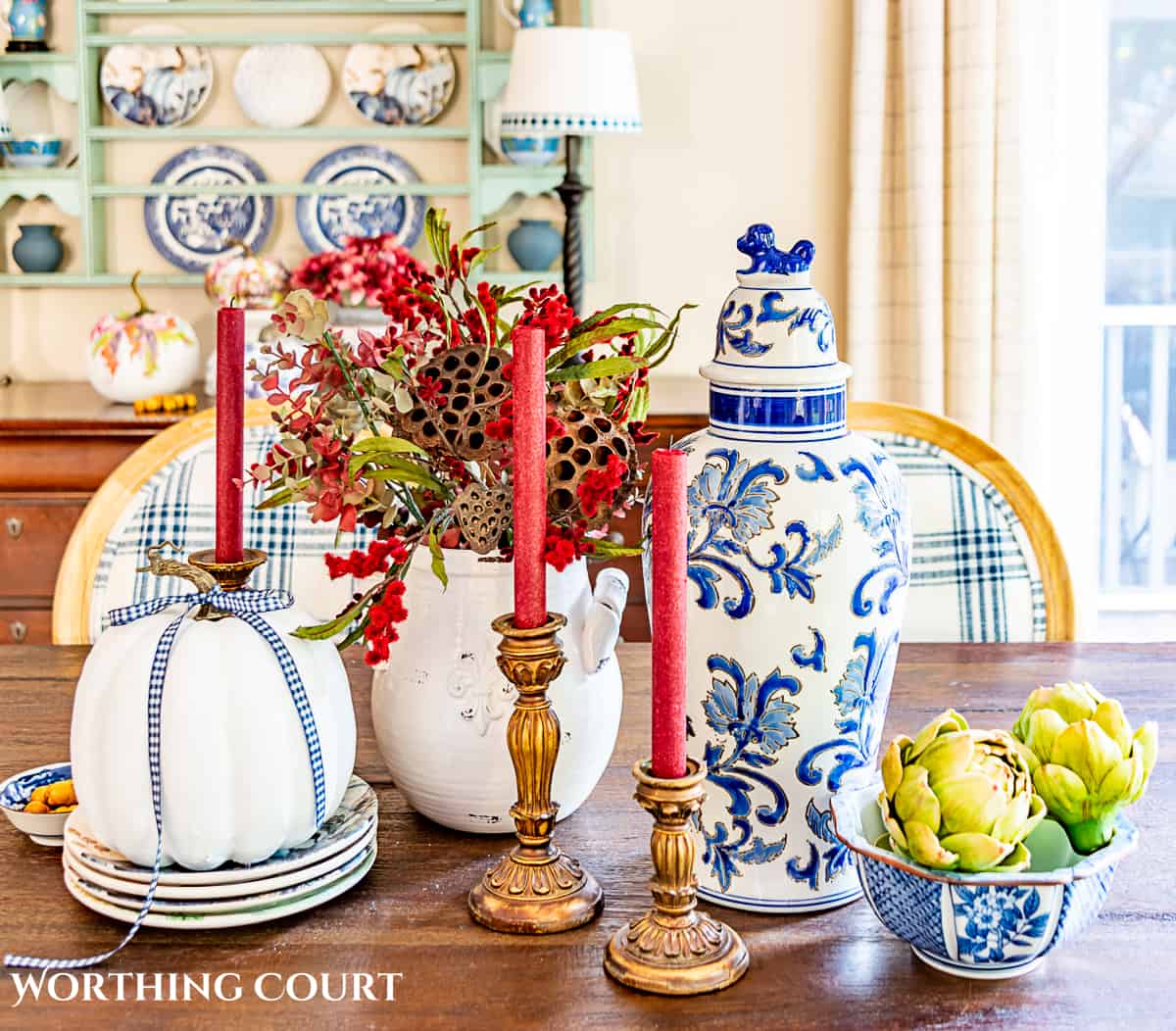 Easy fall decorating idea with a blue and burgundy centerpiece accessories