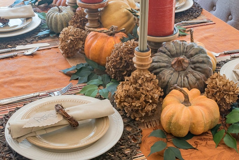 Thanksgiving centerpiece using pumpkins and dried hydrangeas