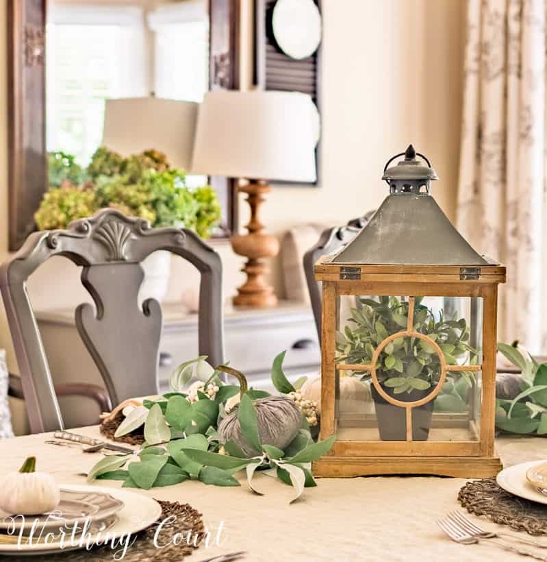 lantern and velvet pumpkin table centerpiece