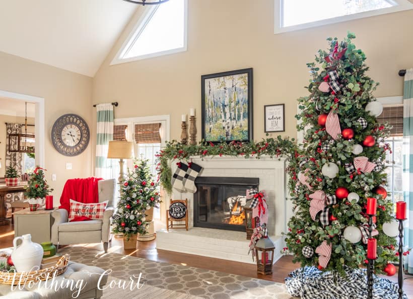 family room and fireplace decorated for Christmas