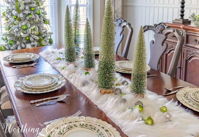 Ornaments on the white faux fur runner.