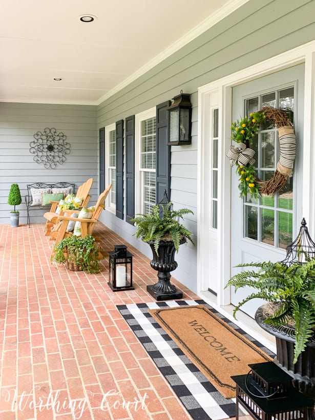 The large porch decorated for spring.