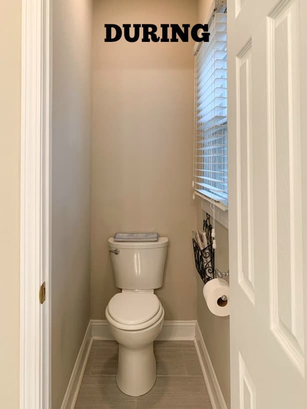 A small toilet area with a door.