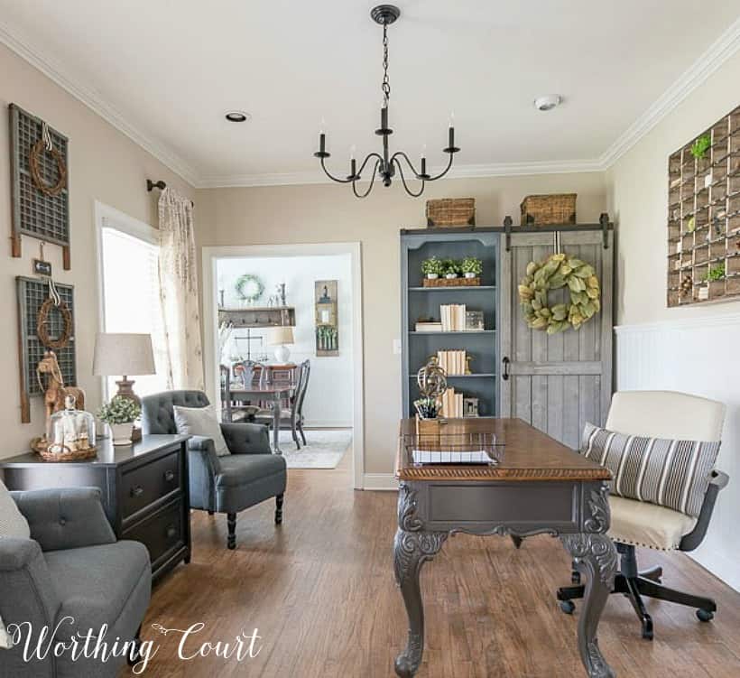 Home office desk, bookcase and chair in grey.