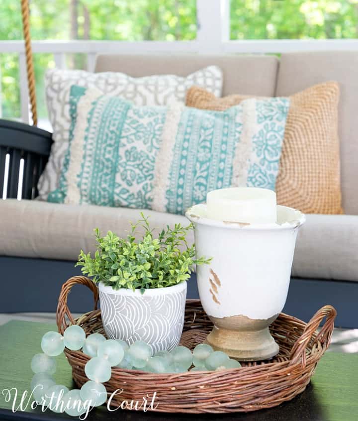 Vignette in a wicker basket tray.