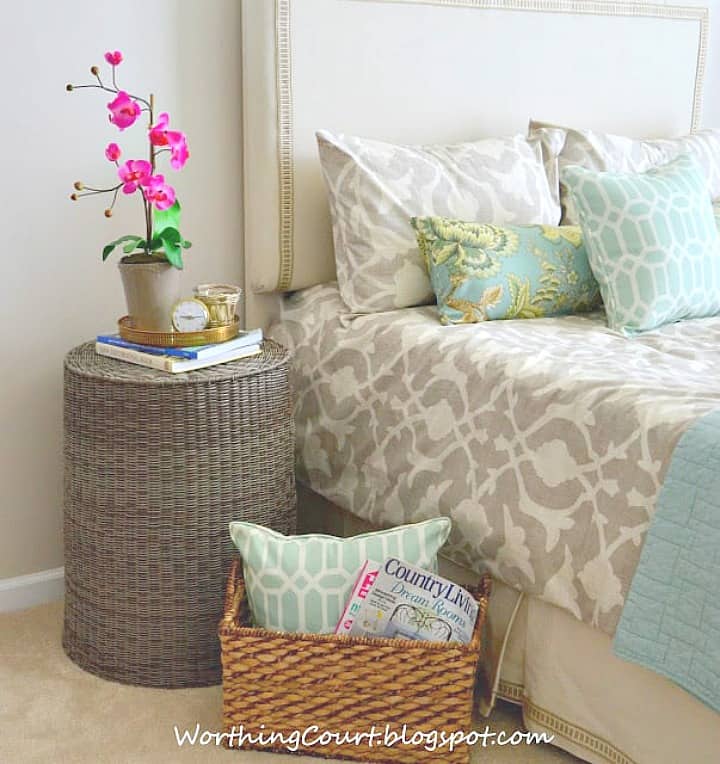 Basket used as a bedroom nightstand.