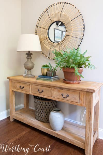 console table with plants and accessories