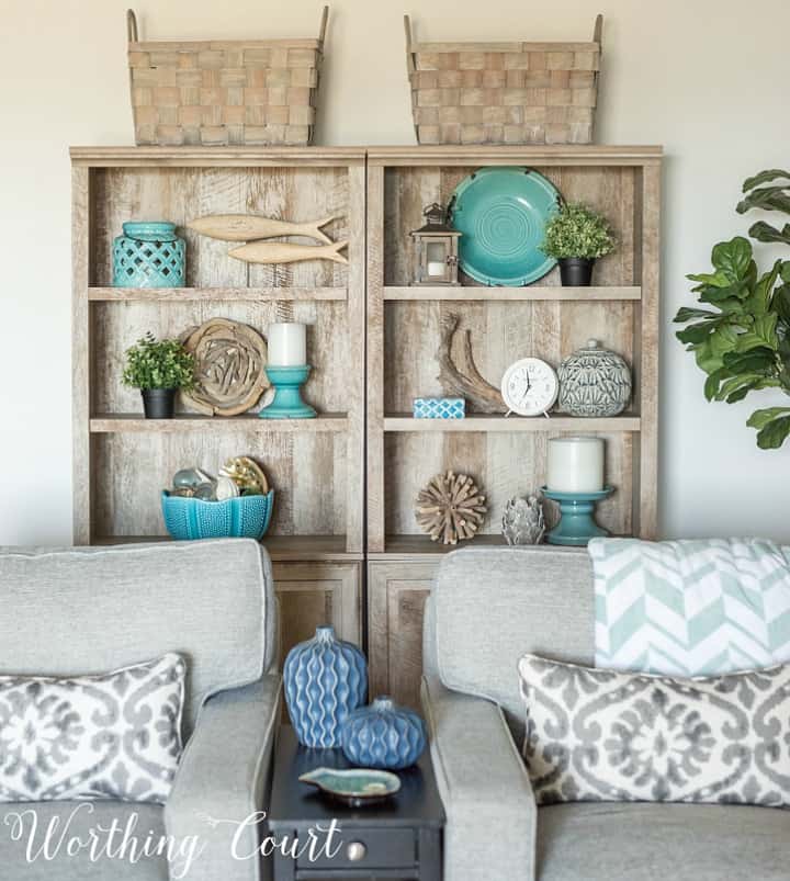 gray bookcases with beach style accessories