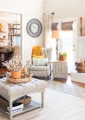 family room with neutral furniture decorated for fall