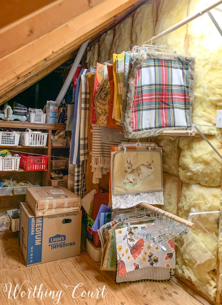 pillow covers and blankets hanging in an attic