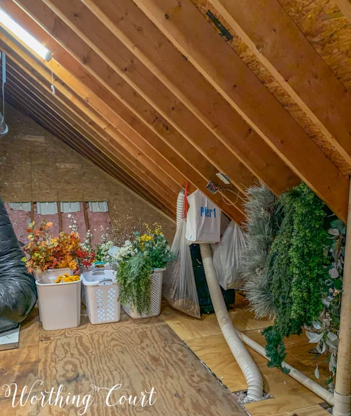 plastic garbage cans holding greenery stems