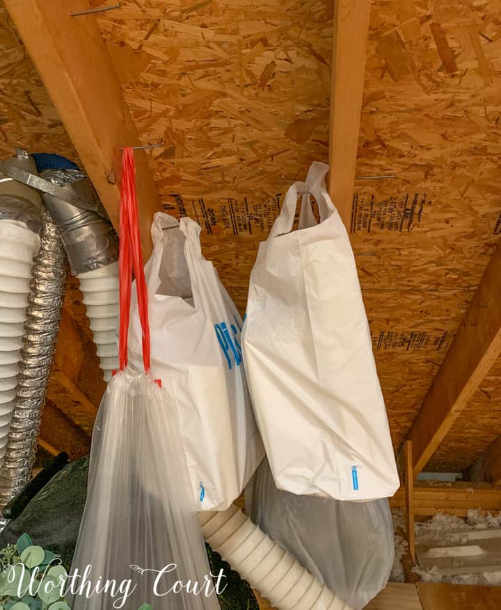 storage bags hanging from ceiling rafters