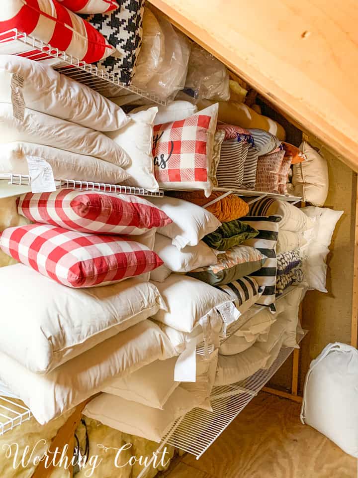 pillow forms stored on shelves in attic