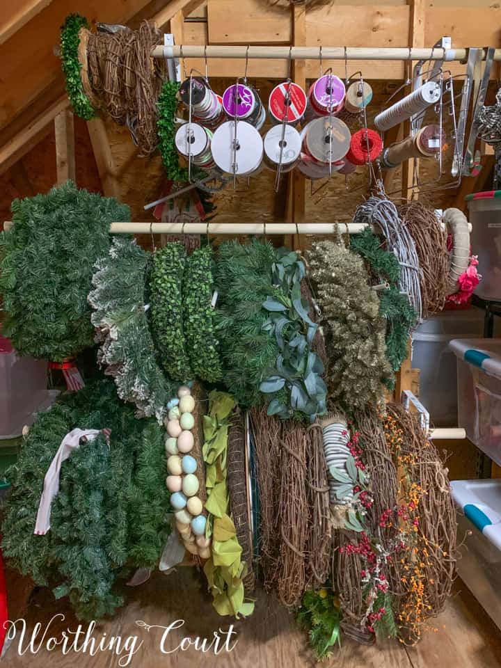 wreaths stored on dowel rods in attic