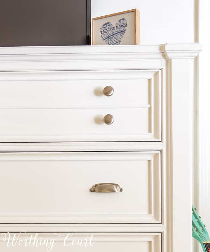 detailed view of white chest of drawers