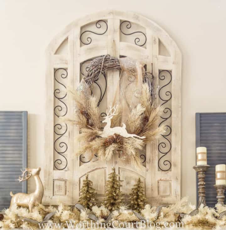 Christmas wreath with frosted neutral pine stems and a glittery deer