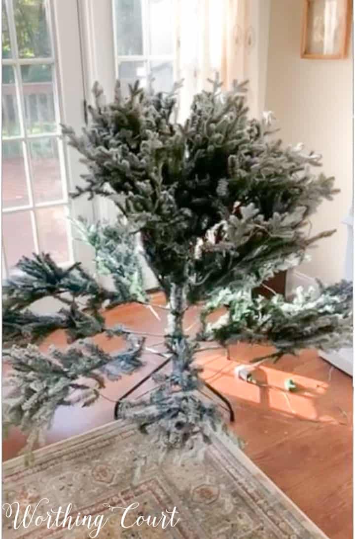 flocked artificial Christmas tree partially put together