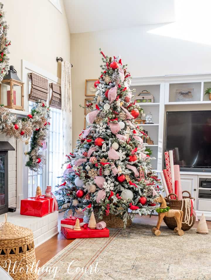 flocked Christmas tree with red and white decorations