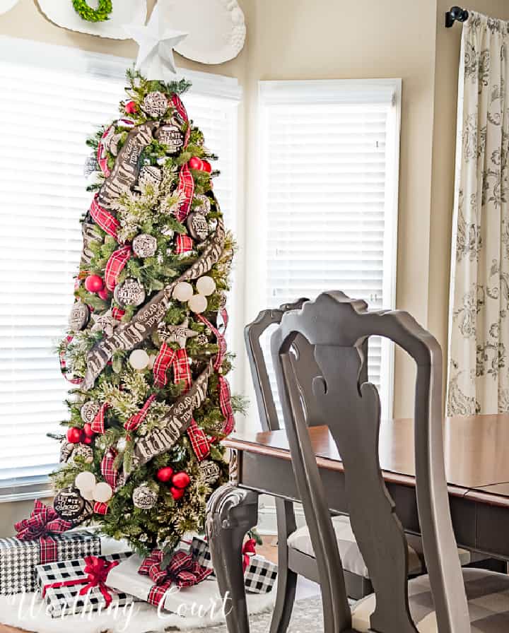 Christmas tree decorated with red, black and white ornaments