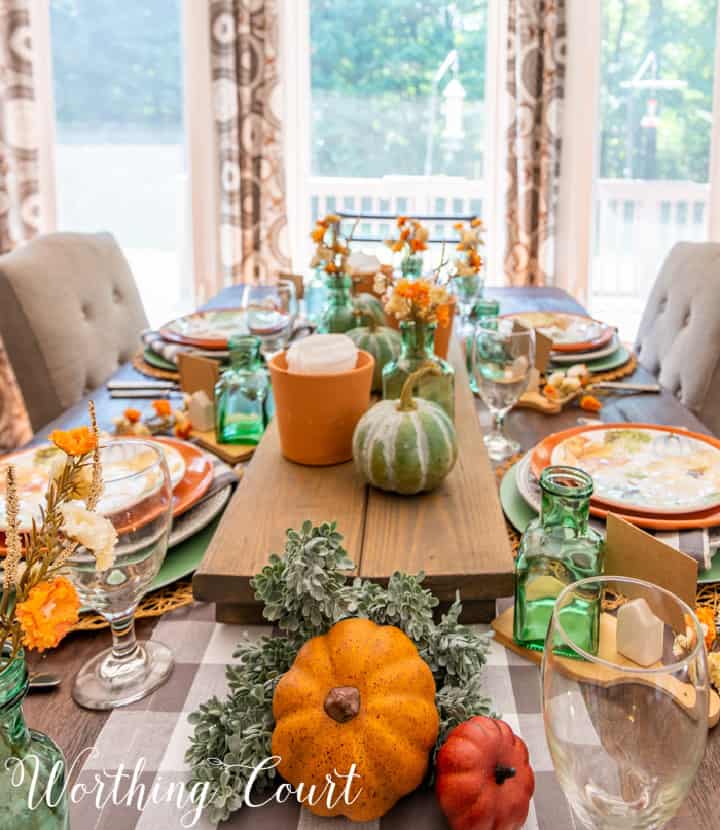 Thanksgiving table set with traditional fall colors and elements