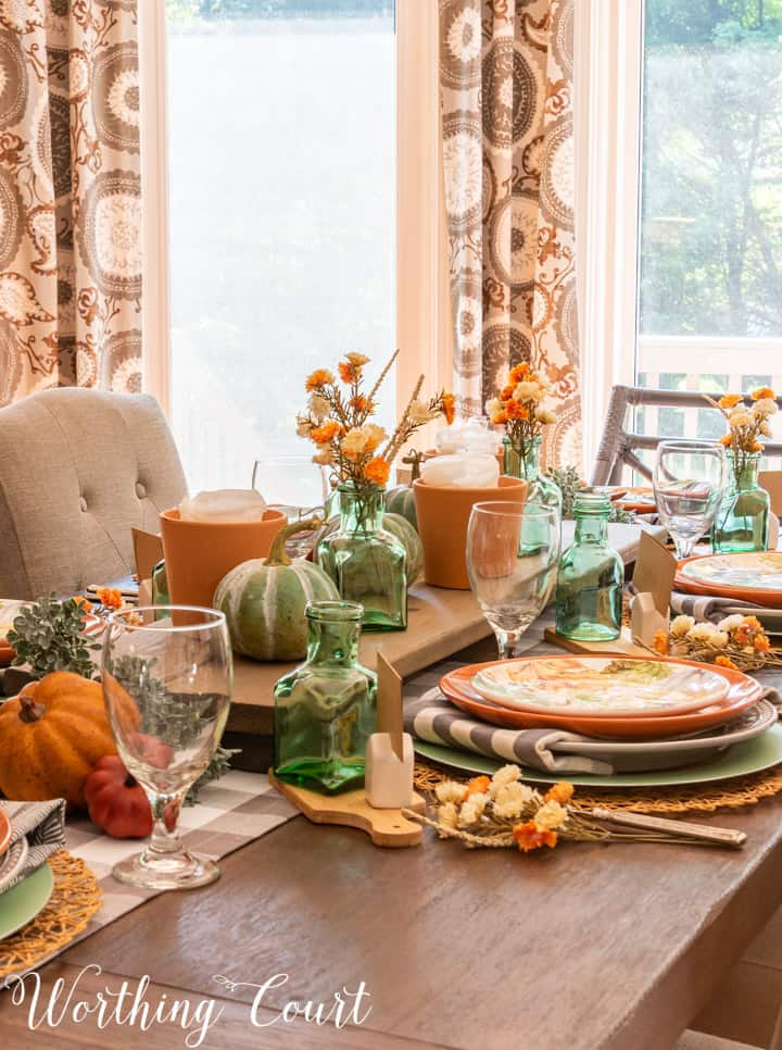 Thanksgiving table set with traditional fall colors and elements